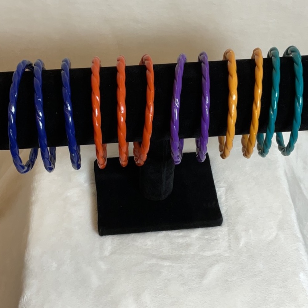 Vintage plastic bangle bracelets. Set of 12. Various colors.